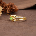 Unique Twisted Heart-Shaped 3-Prong Round Cut Peridot Engagement Ring - Additional view