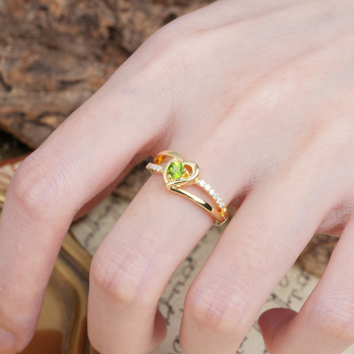 Unique Twisted Heart-Shaped 3-Prong Round Cut Peridot Engagement Ring - Additional view