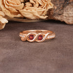 Unique Twisted and Intertwined Double Round Cut Garnet Two-Stone Wedding Ring - Additional view