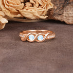 Unique Twisted and Intertwined Double Round Cut Moonstone Two-Stone Wedding Ring - Additional view