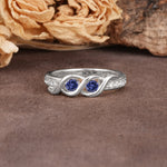 Unique Twisted and Intertwined Double Round Cut Tanzanite Two-Stone Wedding Ring - Additional view