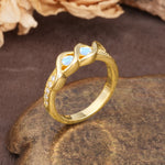 Unique Twisted and Intertwined Double Round Cut Moonstone Two-Stone Wedding Ring - Additional view