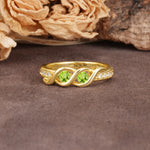 Unique Twisted and Intertwined Double Round Cut Peridot Two-Stone Wedding Ring - Additional view