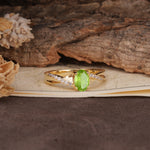 Unique, Luxurious Twisted 4-Prong Oval Cut Peridot Engagement Ring - Additional view
