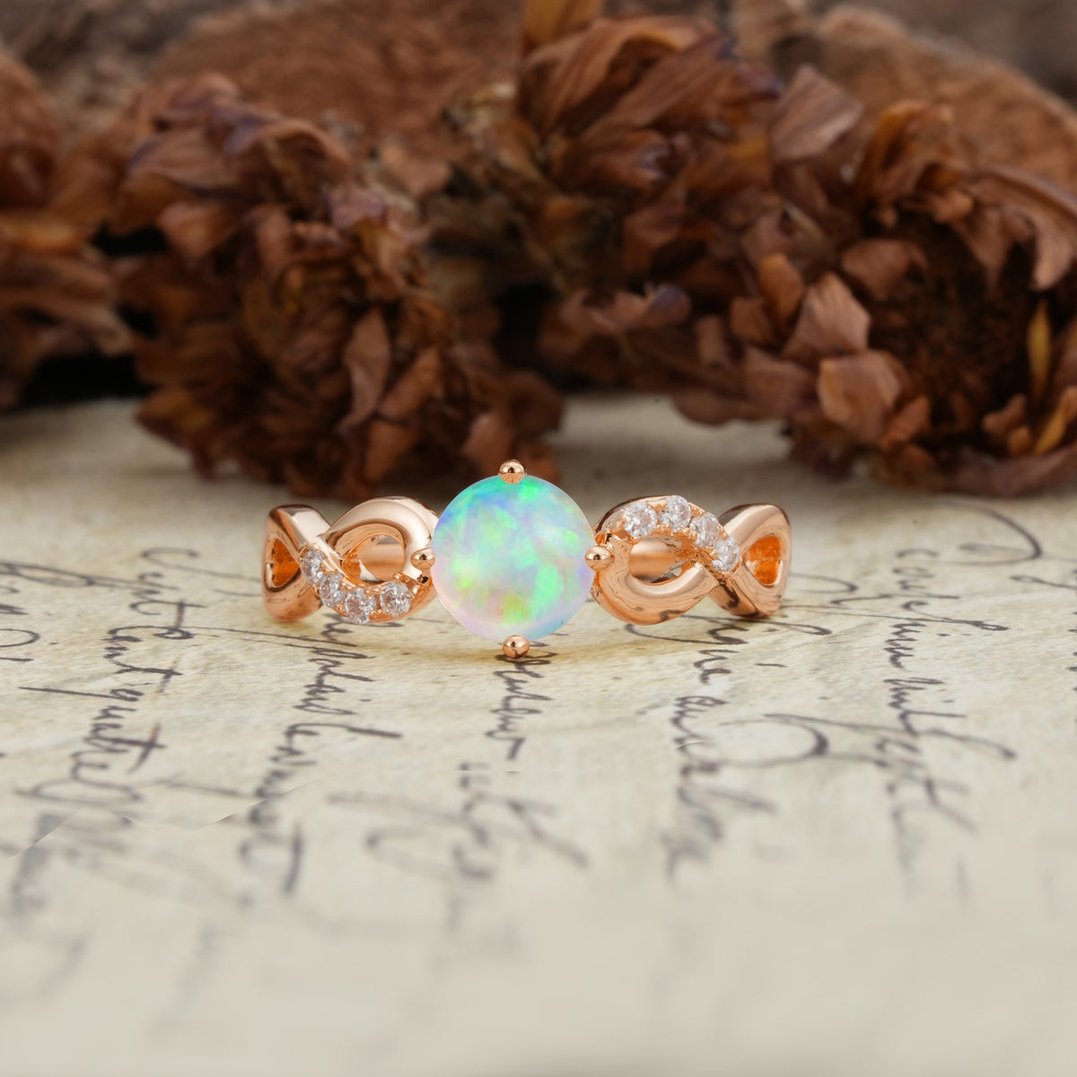 Unique, Luxurious, Twisted-Cross 4-Prong Round Cut Fire Opal Engagement Ring - Additional view