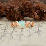 Unique, Luxurious, Twisted-Cross 4-Prong Round Cut Fire Opal Engagement Ring - Additional view