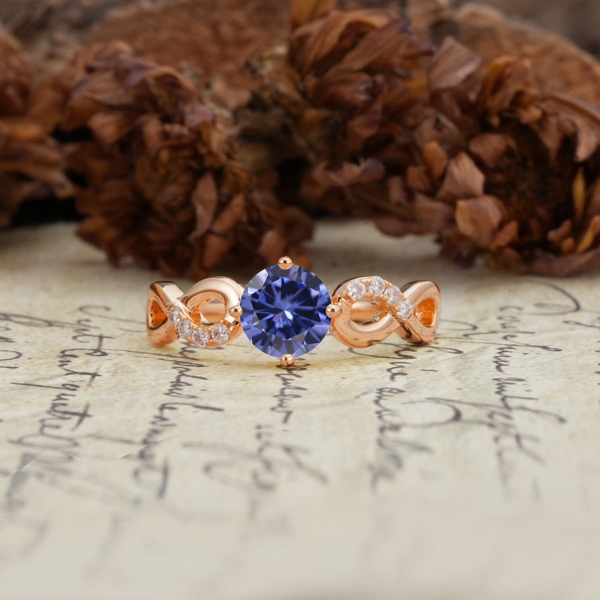 Unique, Luxurious, Twisted-Cross 4-Prong Round Cut Tanzanite Engagement Ring - Additional view
