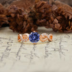 Unique, Luxurious, Twisted-Cross 4-Prong Round Cut Tanzanite Engagement Ring - Additional view