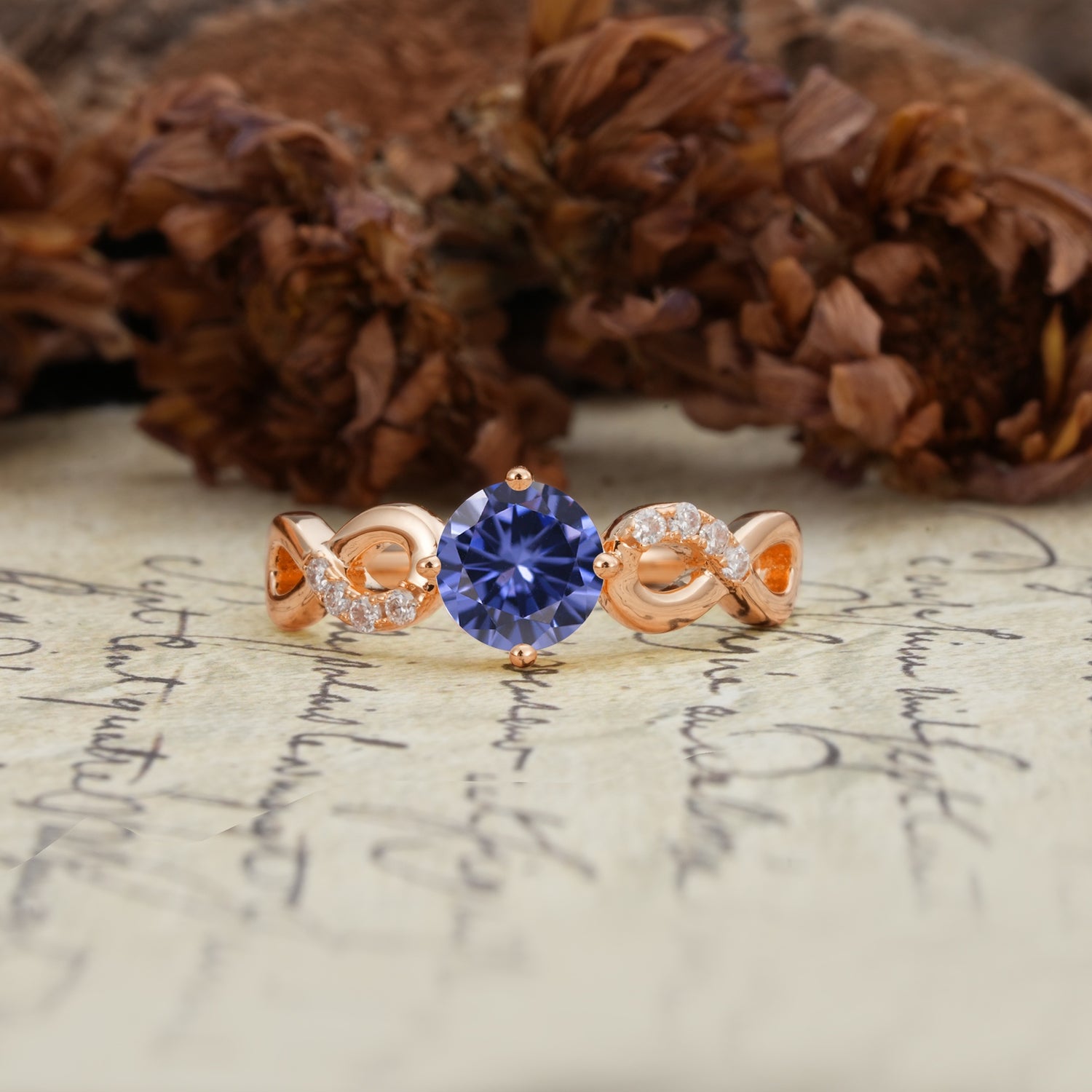 Unique, Luxurious, Twisted-Cross 4-Prong Round Cut Tanzanite Engagement Ring - Additional view