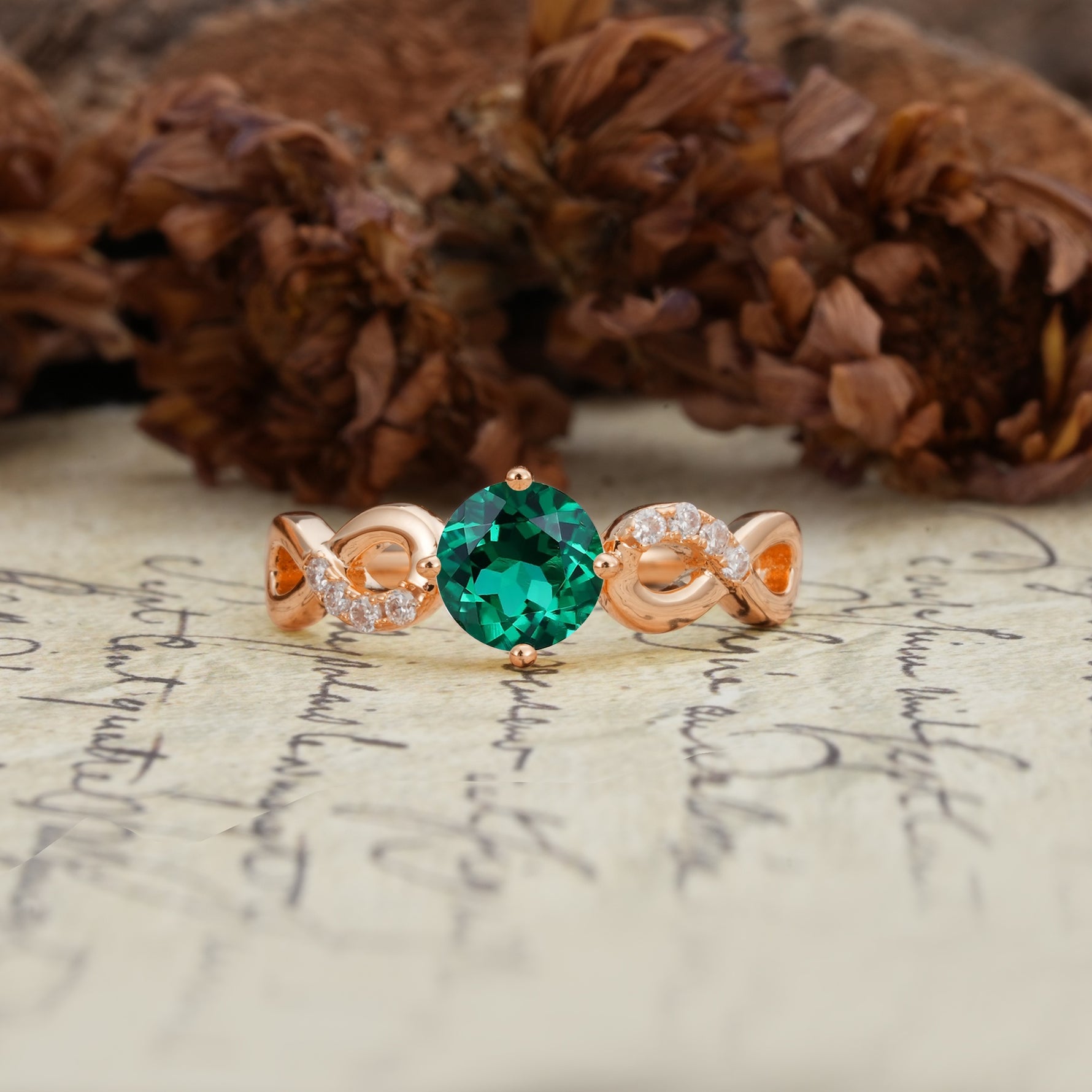 Unique, Luxurious, Twisted-Cross 4-Prong Round Cut Emerald Engagement Ring - Additional view