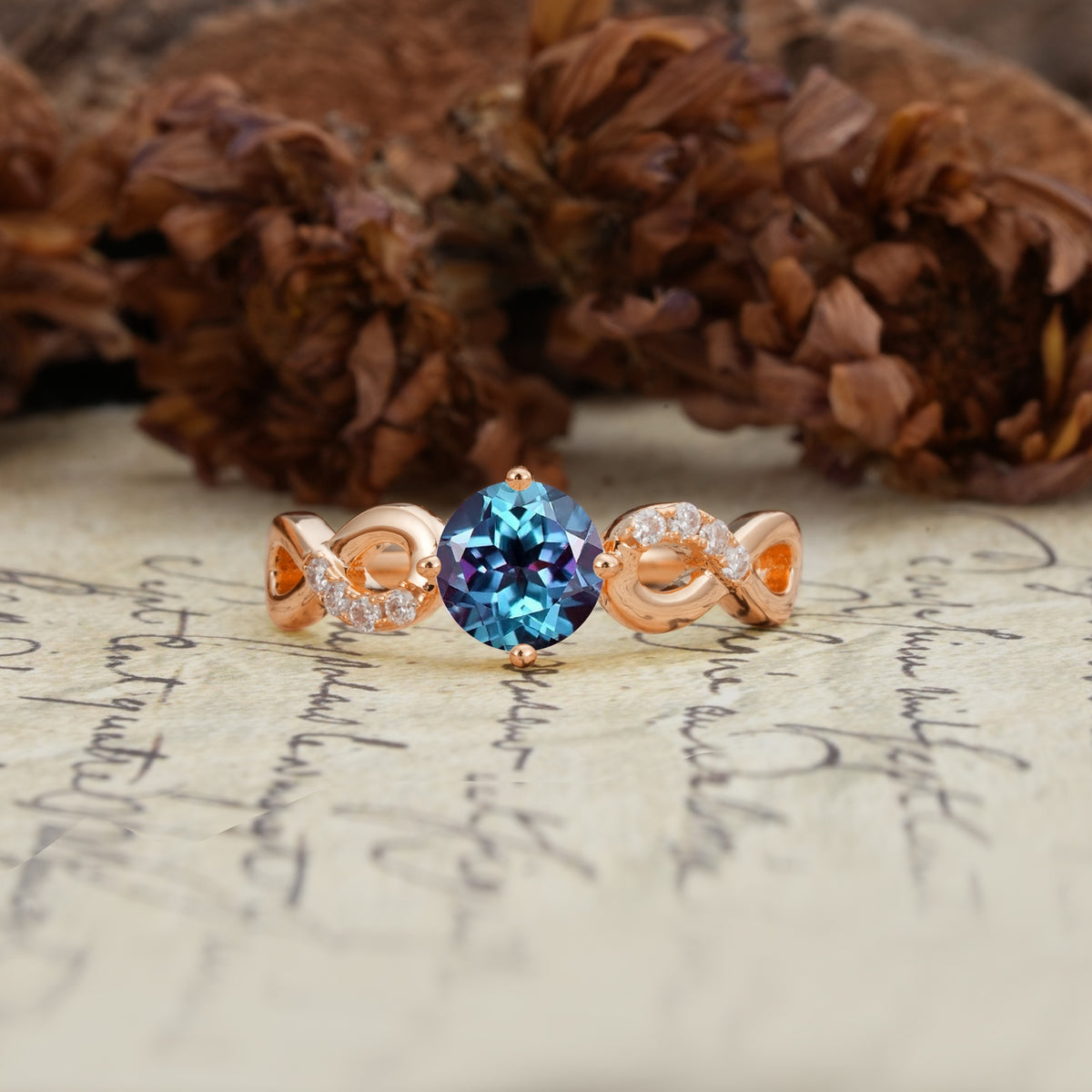 Unique, Luxurious, Twisted-Cross 4-Prong Round Cut Alexandrite Engagement Ring - Additional view
