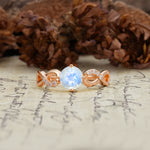 Unique, Luxurious, Twisted-Cross 4-Prong Round Cut Moonstone Engagement Ring - Additional view