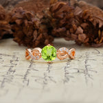Unique, Luxurious, Twisted-Cross 4-Prong Round Cut Peridot Engagement Ring - Additional view