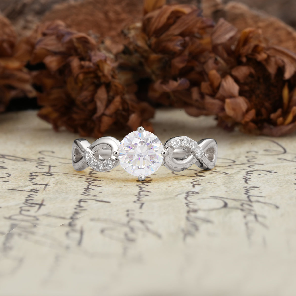 Unique, Luxurious, Twisted-Cross 4-Prong Round Cut Moissanite Engagement Ring - Additional view