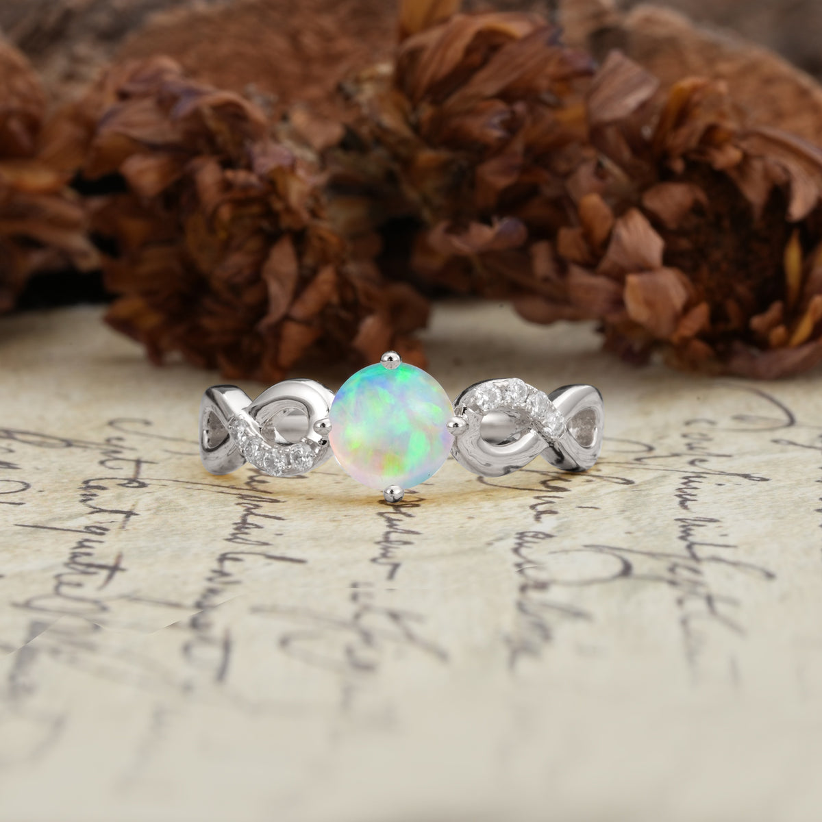 Unique, Luxurious, Twisted-Cross 4-Prong Round Cut Fire Opal Engagement Ring - Additional view