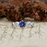 Unique, Luxurious, Twisted-Cross 4-Prong Round Cut Tanzanite Engagement Ring - Additional view