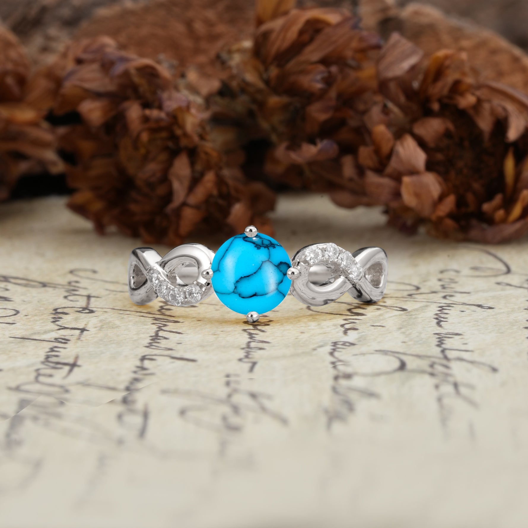 Unique, Luxurious, Twisted-Cross 4-Prong Round Cut Turquoise Engagement Ring - Additional view