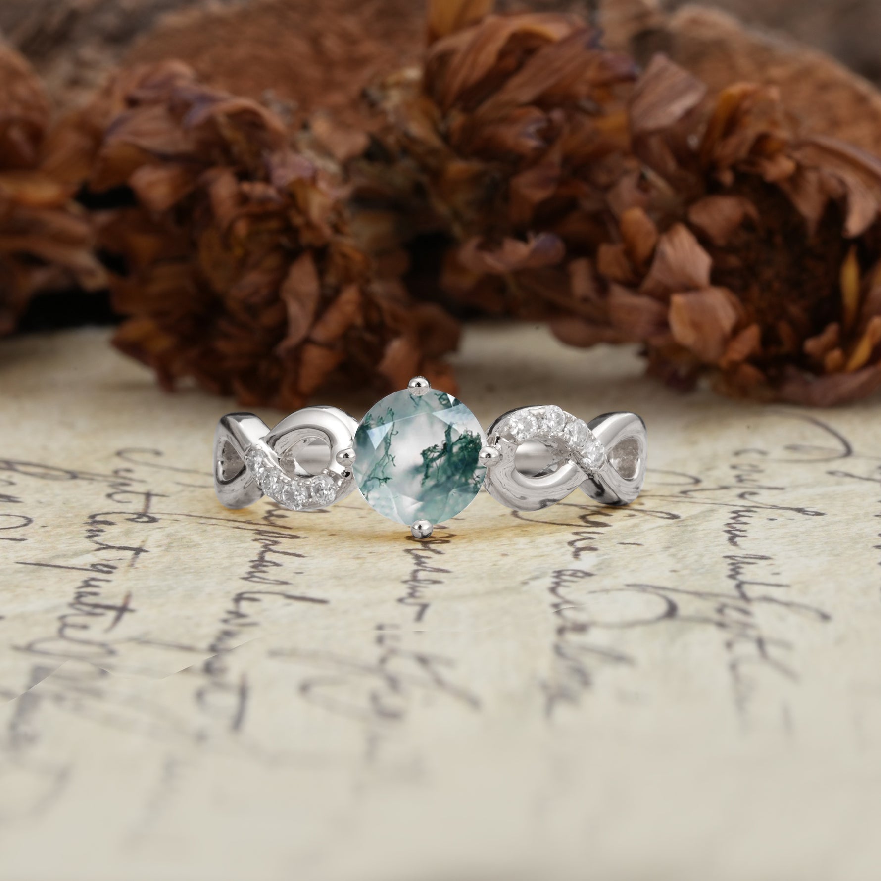 Unique, Luxurious, Twisted-Cross 4-Prong Round Cut Moss Agate Engagement Ring - Additional view