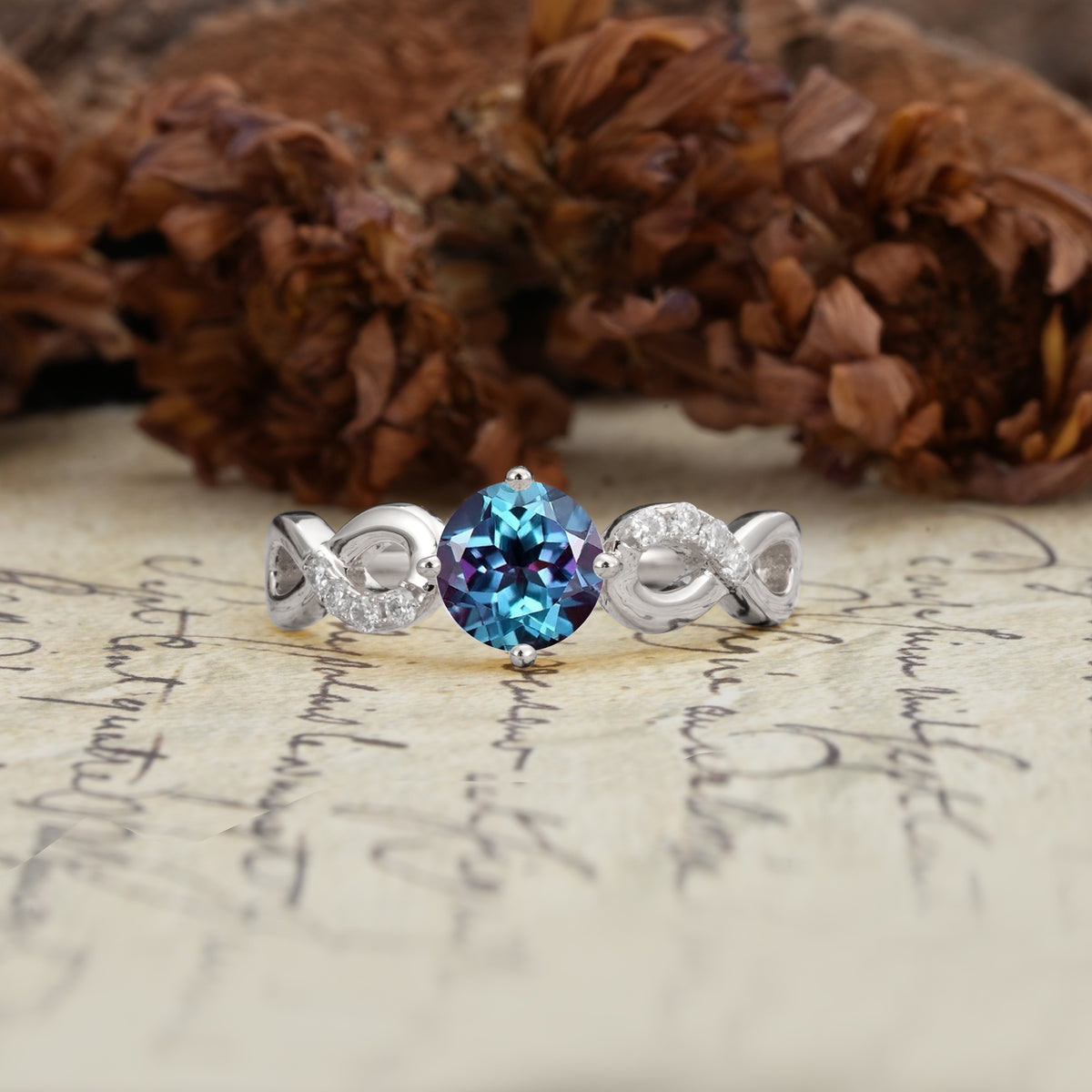 Unique, Luxurious, Twisted-Cross 4-Prong Round Cut Alexandrite Engagement Ring - Additional view