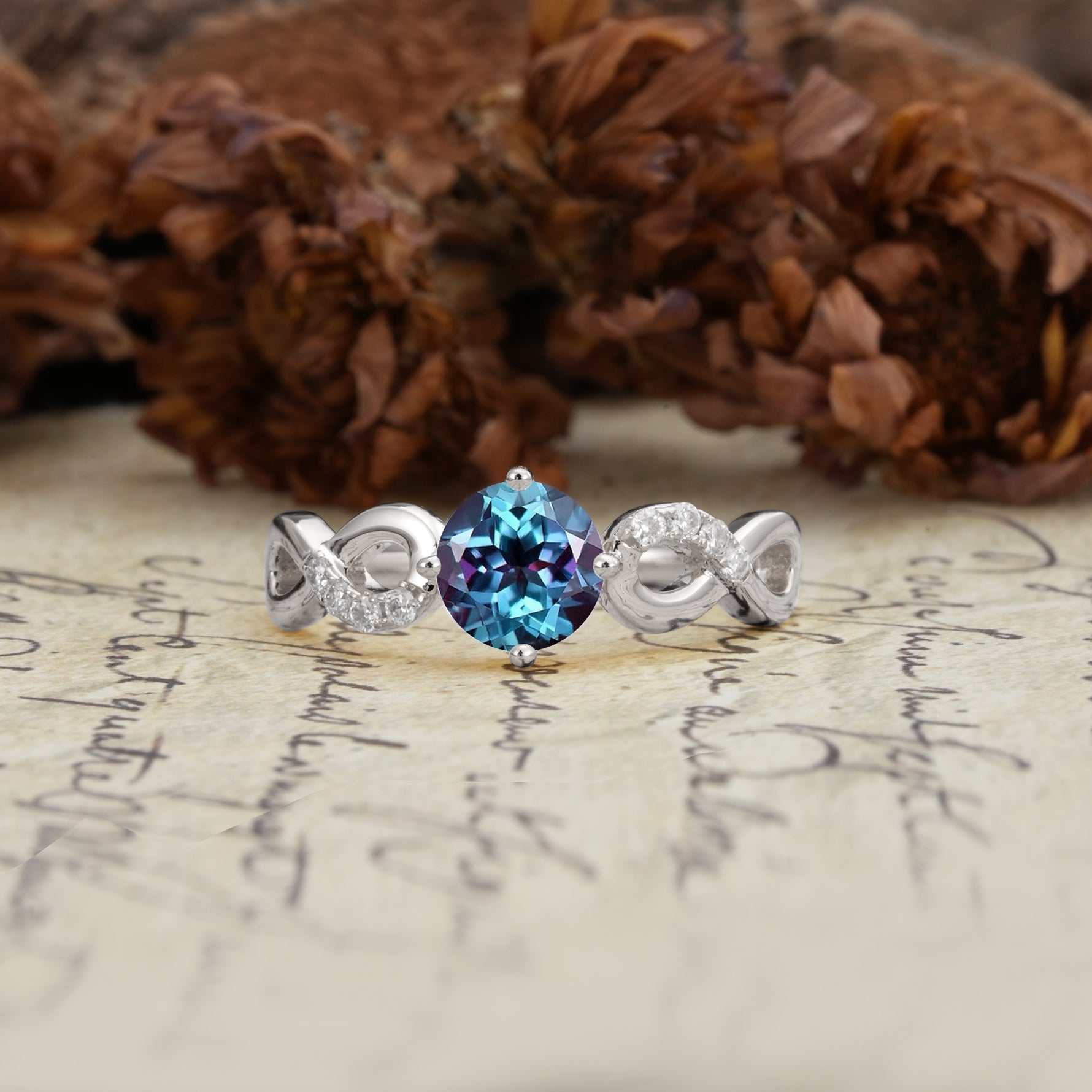 Unique, Luxurious, Twisted-Cross 4-Prong Round Cut Alexandrite Engagement Ring - Additional view