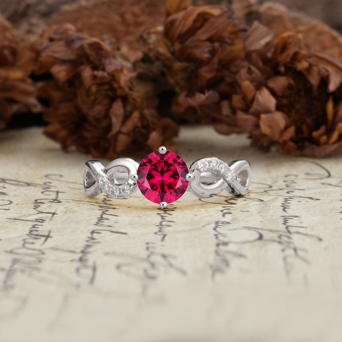 Unique, Luxurious, Twisted-Cross 4-Prong Round Cut Ruby Engagement Ring - Additional view
