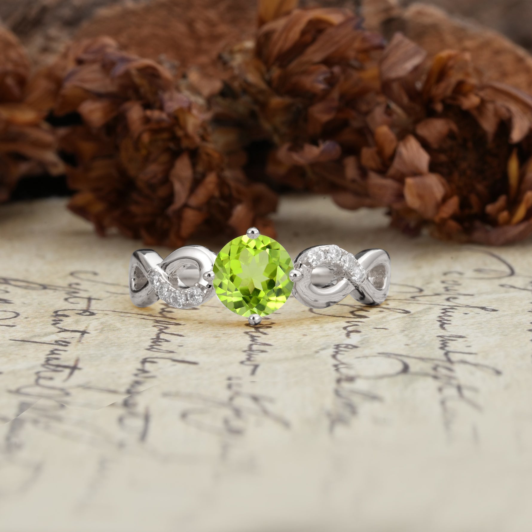 Unique, Luxurious, Twisted-Cross 4-Prong Round Cut Peridot Engagement Ring - Additional view