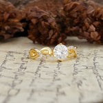 Unique, Luxurious, Twisted-Cross 4-Prong Round Cut Moissanite Engagement Ring - Additional view