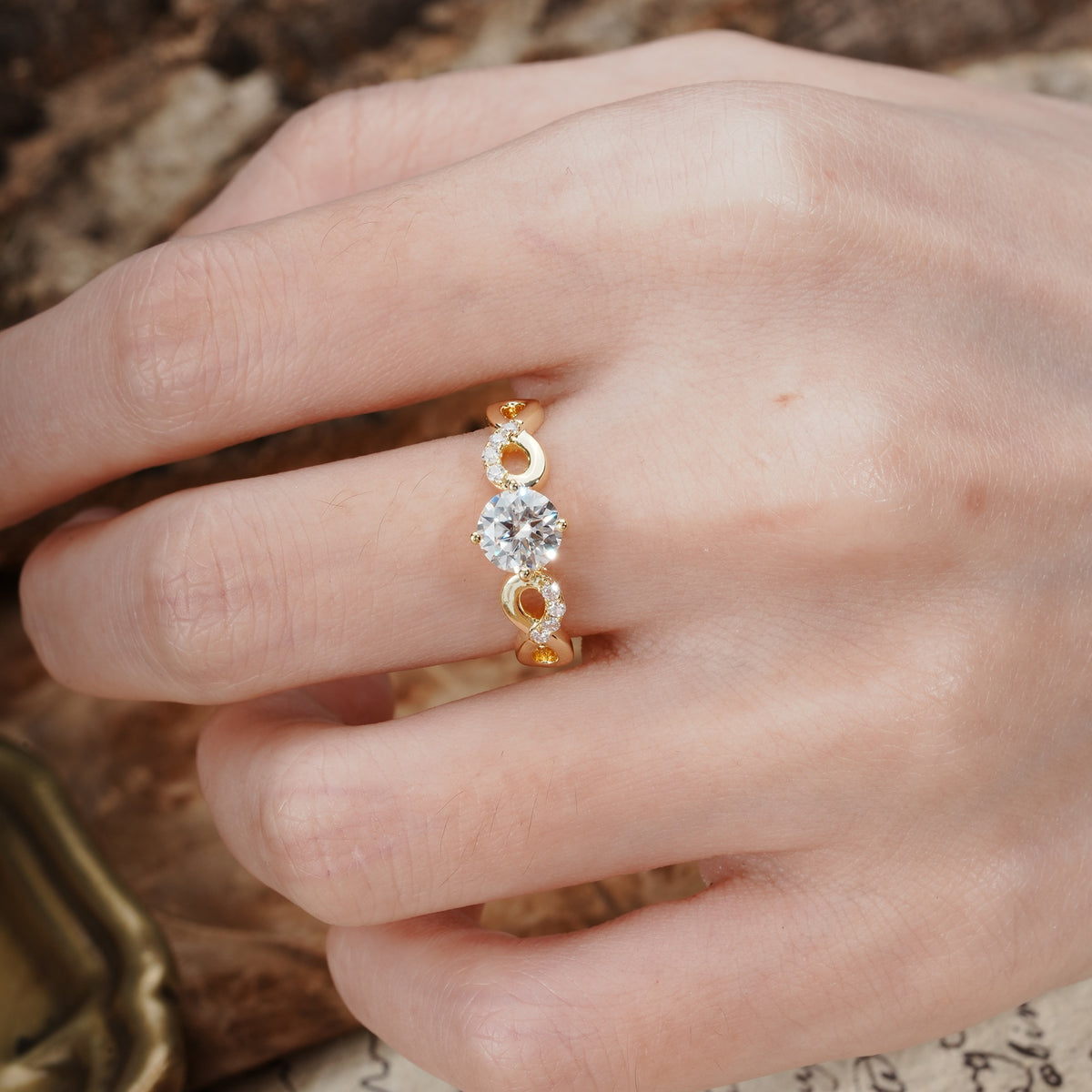 Unique, Luxurious, Twisted-Cross 4-Prong Round Cut Moissanite Engagement Ring - Additional view