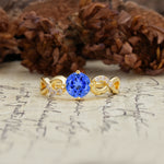 Unique, Luxurious, Twisted-Cross 4-Prong Round Cut Sapphire Engagement Ring - Additional view