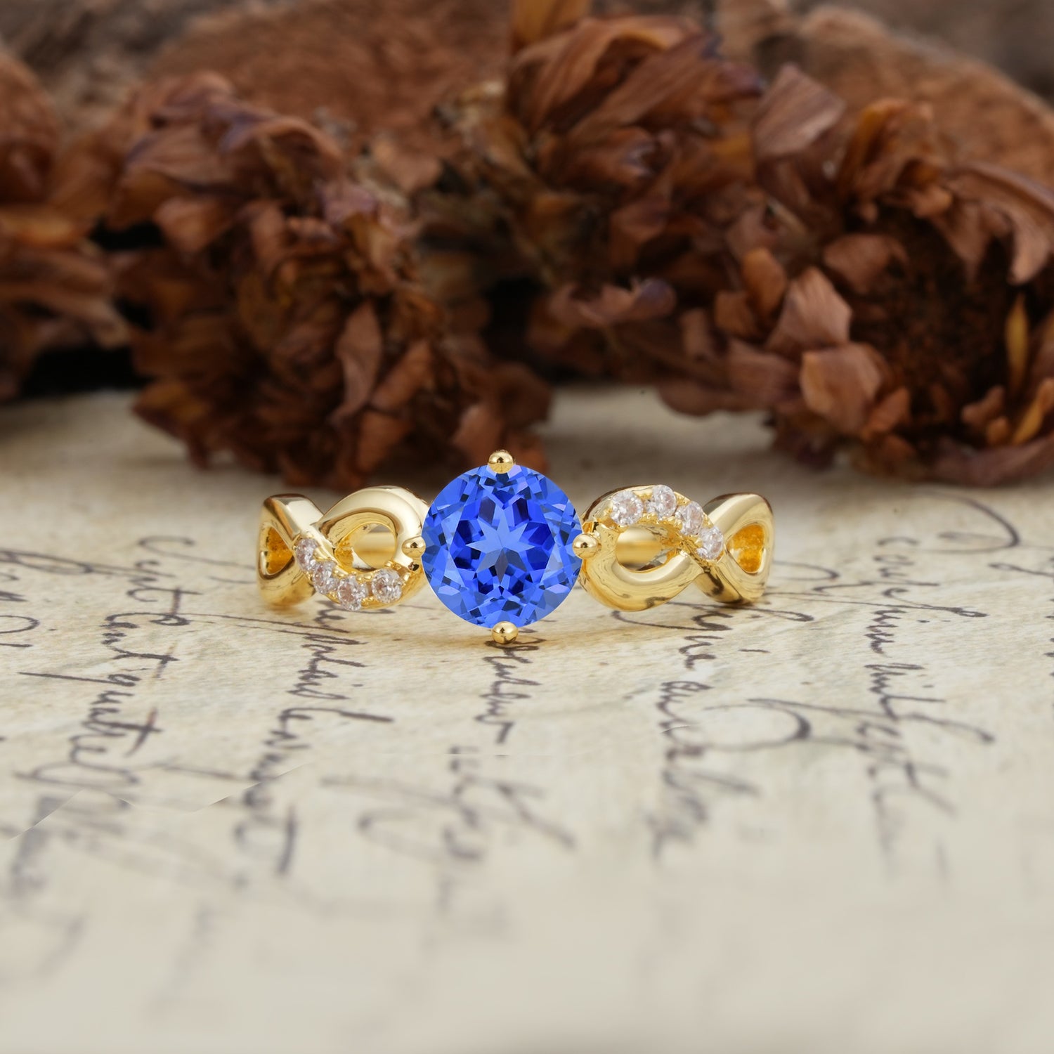 Unique, Luxurious, Twisted-Cross 4-Prong Round Cut Sapphire Engagement Ring - Additional view