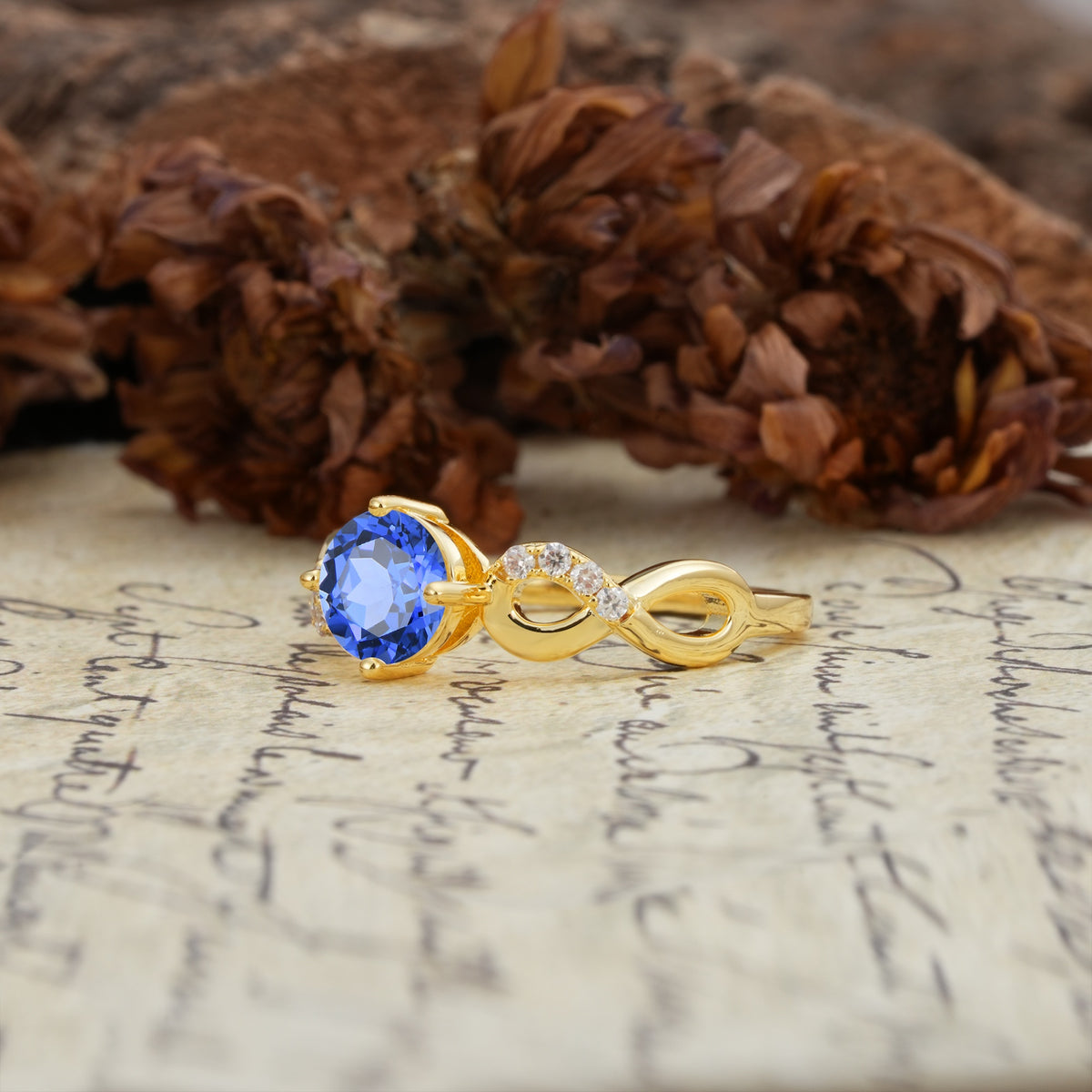Unique, Luxurious, Twisted-Cross 4-Prong Round Cut Sapphire Engagement Ring - Additional view