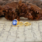 Unique, Luxurious, Twisted-Cross 4-Prong Round Cut Sapphire Engagement Ring - Additional view