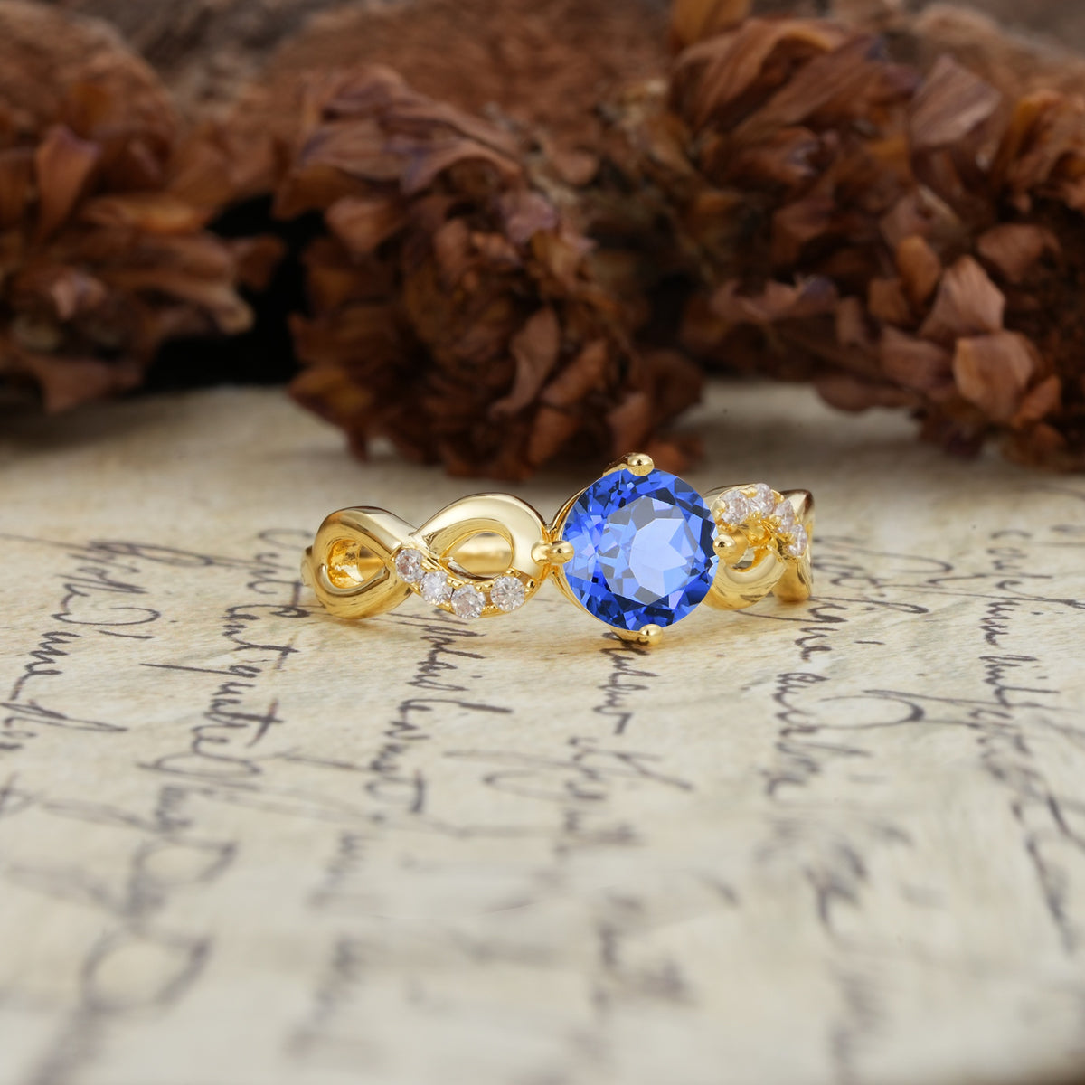 Unique, Luxurious, Twisted-Cross 4-Prong Round Cut Sapphire Engagement Ring - Additional view