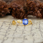 Unique, Luxurious, Twisted-Cross 4-Prong Round Cut Sapphire Engagement Ring - Additional view