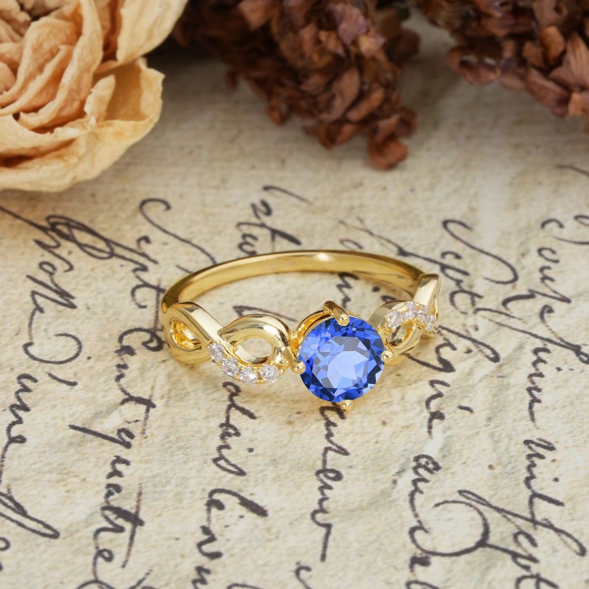 Unique, Luxurious, Twisted-Cross 4-Prong Round Cut Sapphire Engagement Ring - Additional view
