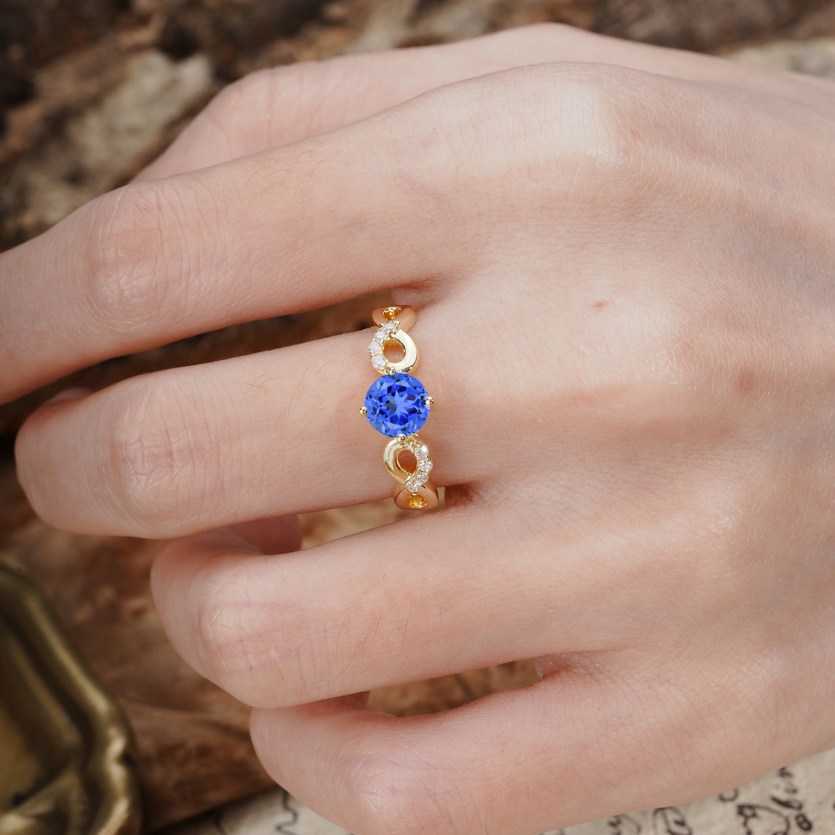 Unique, Luxurious, Twisted-Cross 4-Prong Round Cut Sapphire Engagement Ring - Additional view