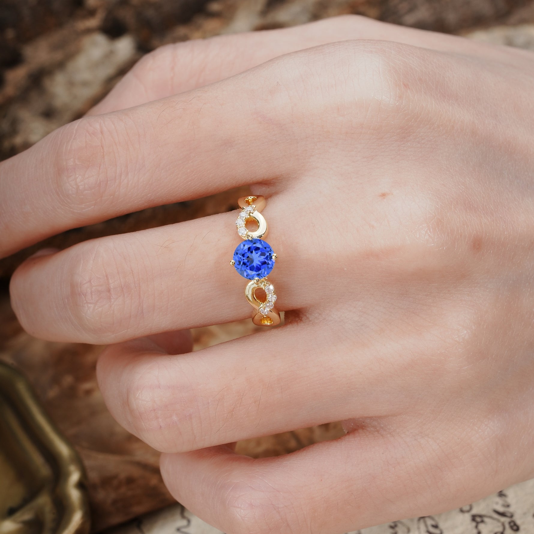 Unique, Luxurious, Twisted-Cross 4-Prong Round Cut Sapphire Engagement Ring - Additional view