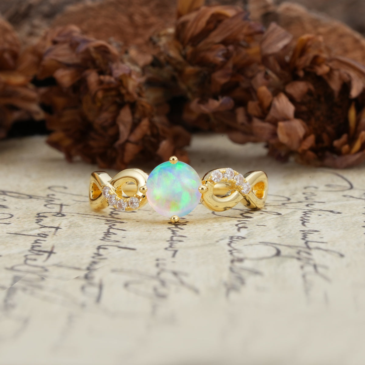 Unique, Luxurious, Twisted-Cross 4-Prong Round Cut Fire Opal Engagement Ring - Additional view
