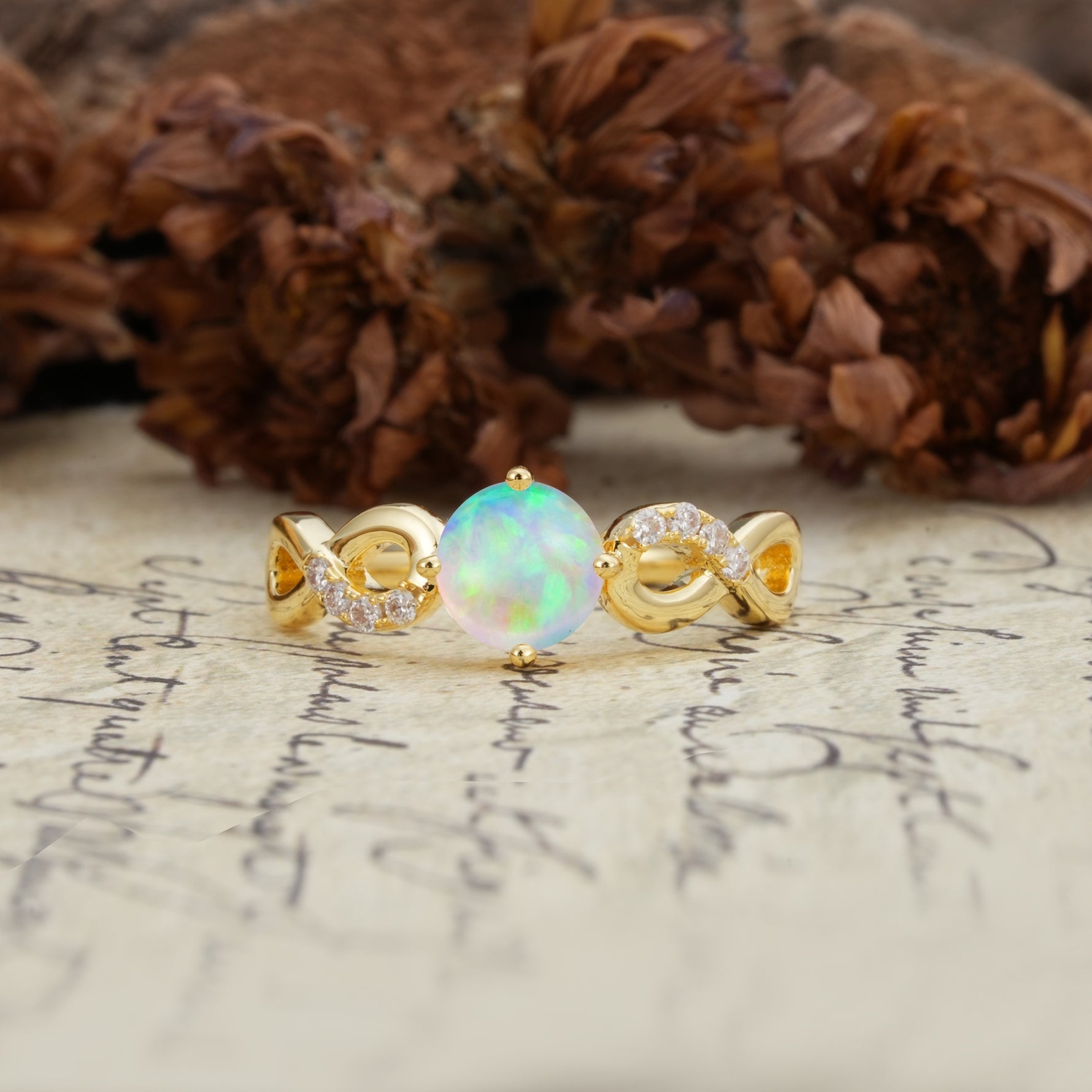 Unique, Luxurious, Twisted-Cross 4-Prong Round Cut Fire Opal Engagement Ring - Additional view