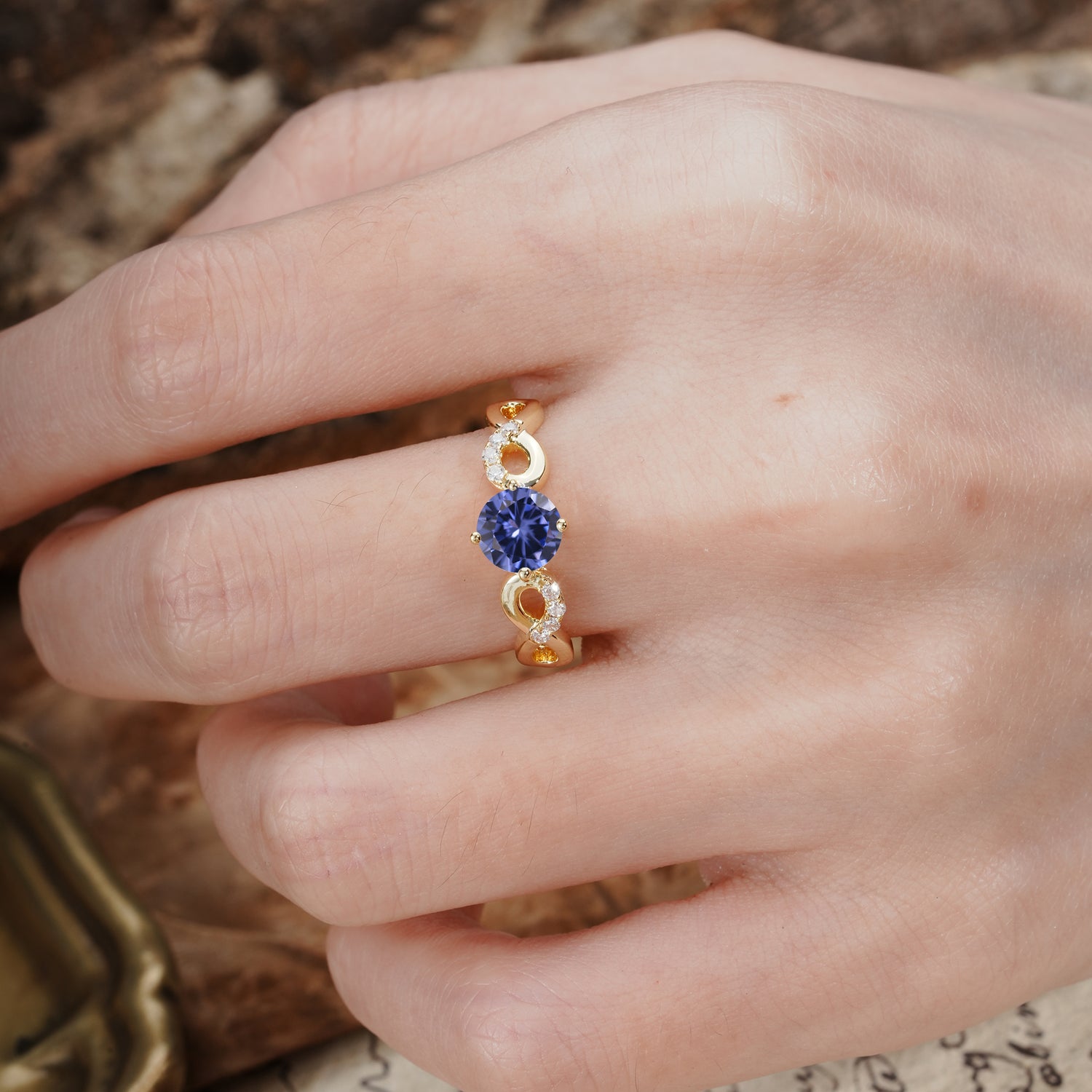 Unique, Luxurious, Twisted-Cross 4-Prong Round Cut Tanzanite Engagement Ring