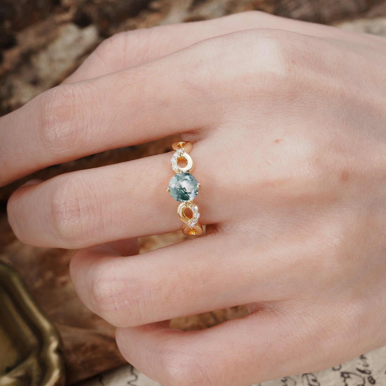 Unique, Luxurious, Twisted-Cross 4-Prong Round Cut Moss Agate Engagement Ring