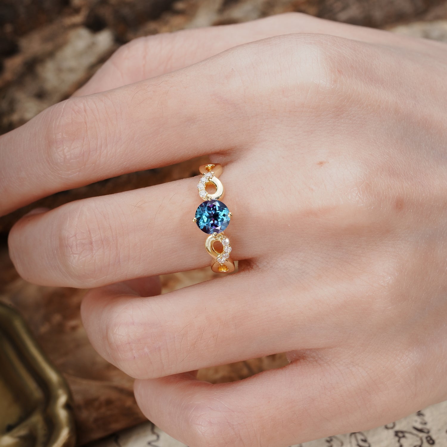 Unique, Luxurious, Twisted-Cross 4-Prong Round Cut Alexandrite Engagement Ring