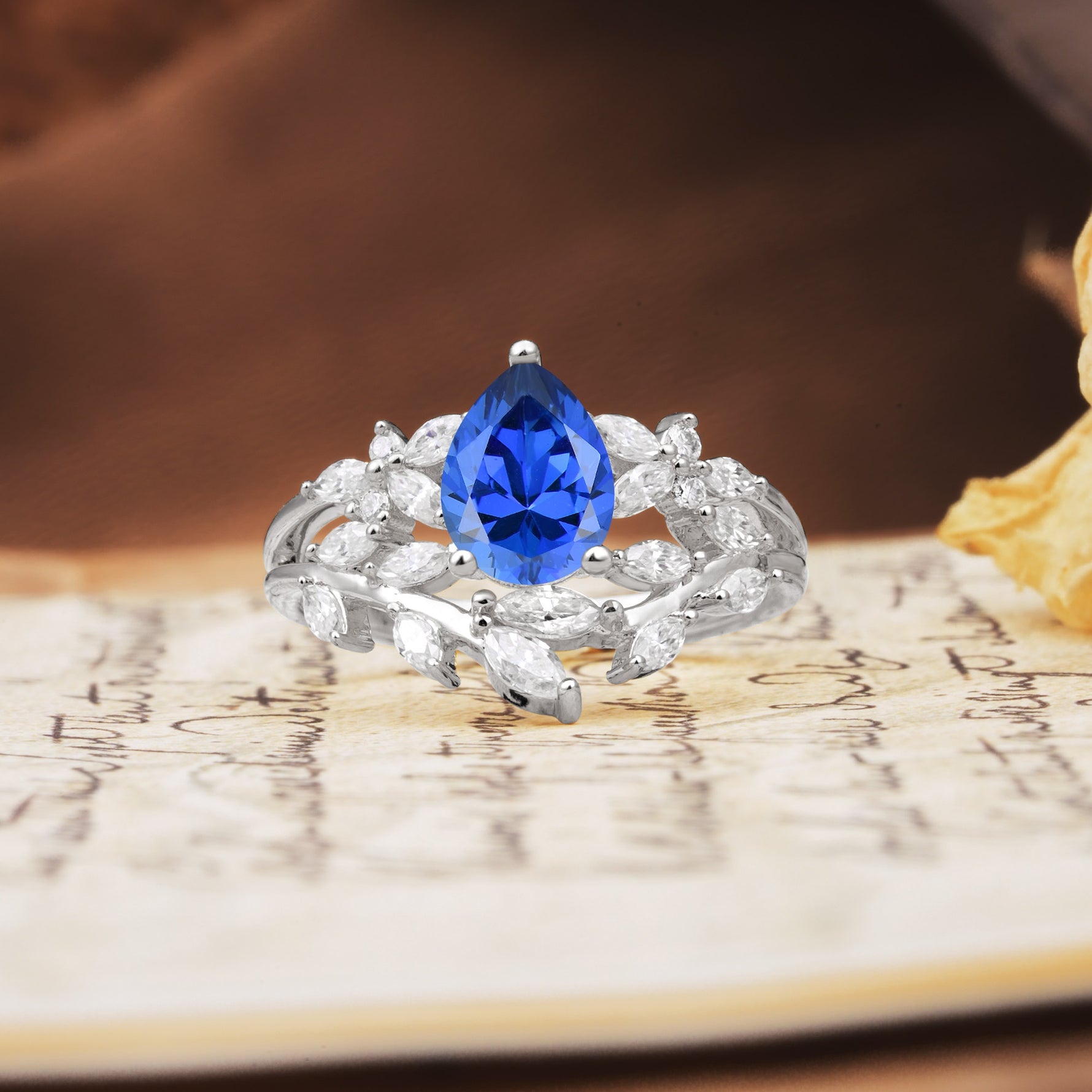 Natural Inspiration Luxury 3-Prong Pear Cut Sapphire Engagement Ring - Additional view