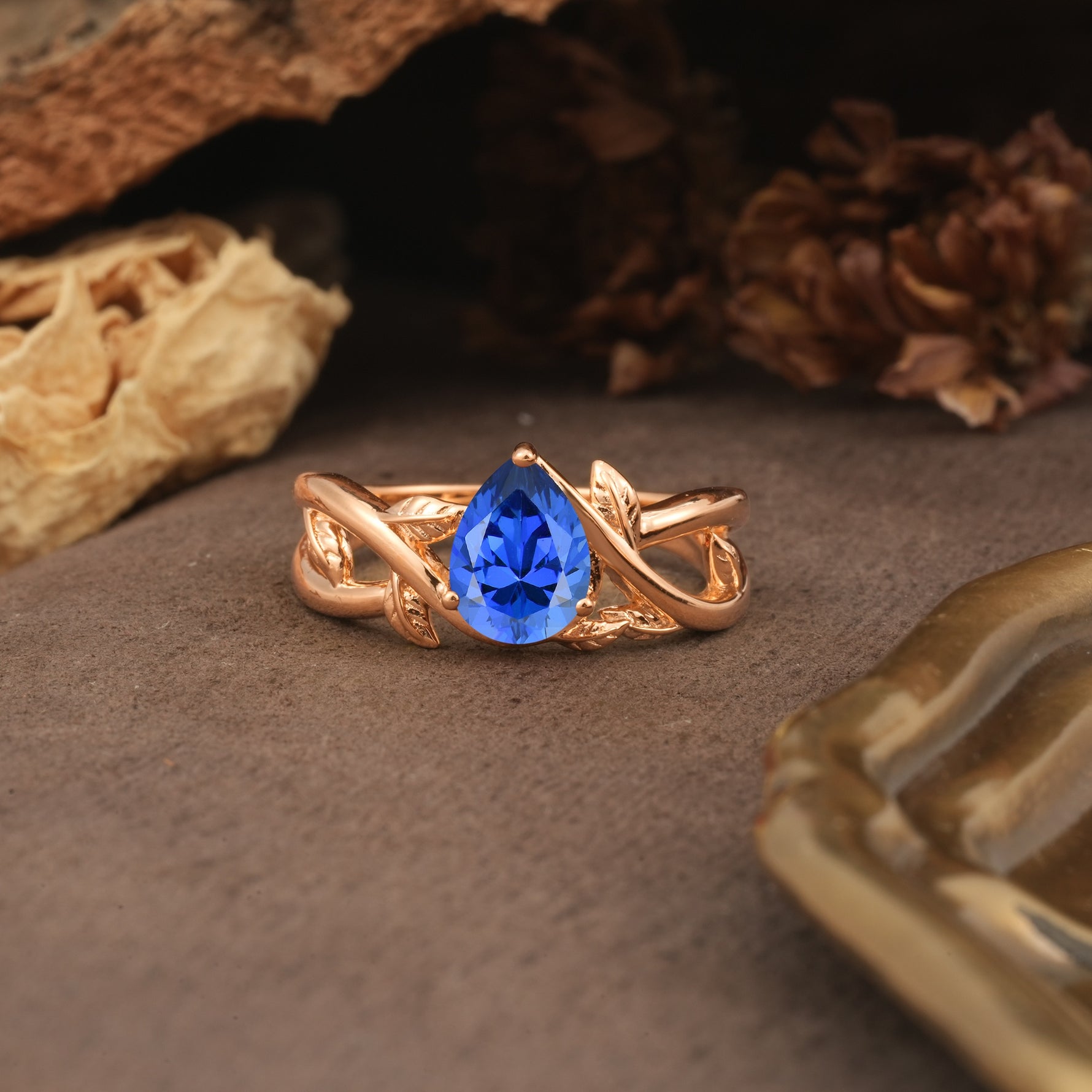 Nature-Inspired Classic Luxury: Entwined 3-Prong Pear Cut Sapphire Engagement Ring - Additional view