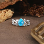 Nature-Inspired Classic Luxury: Entwined 3-Prong Pear Cut Turquoise Engagement Ring - Additional view