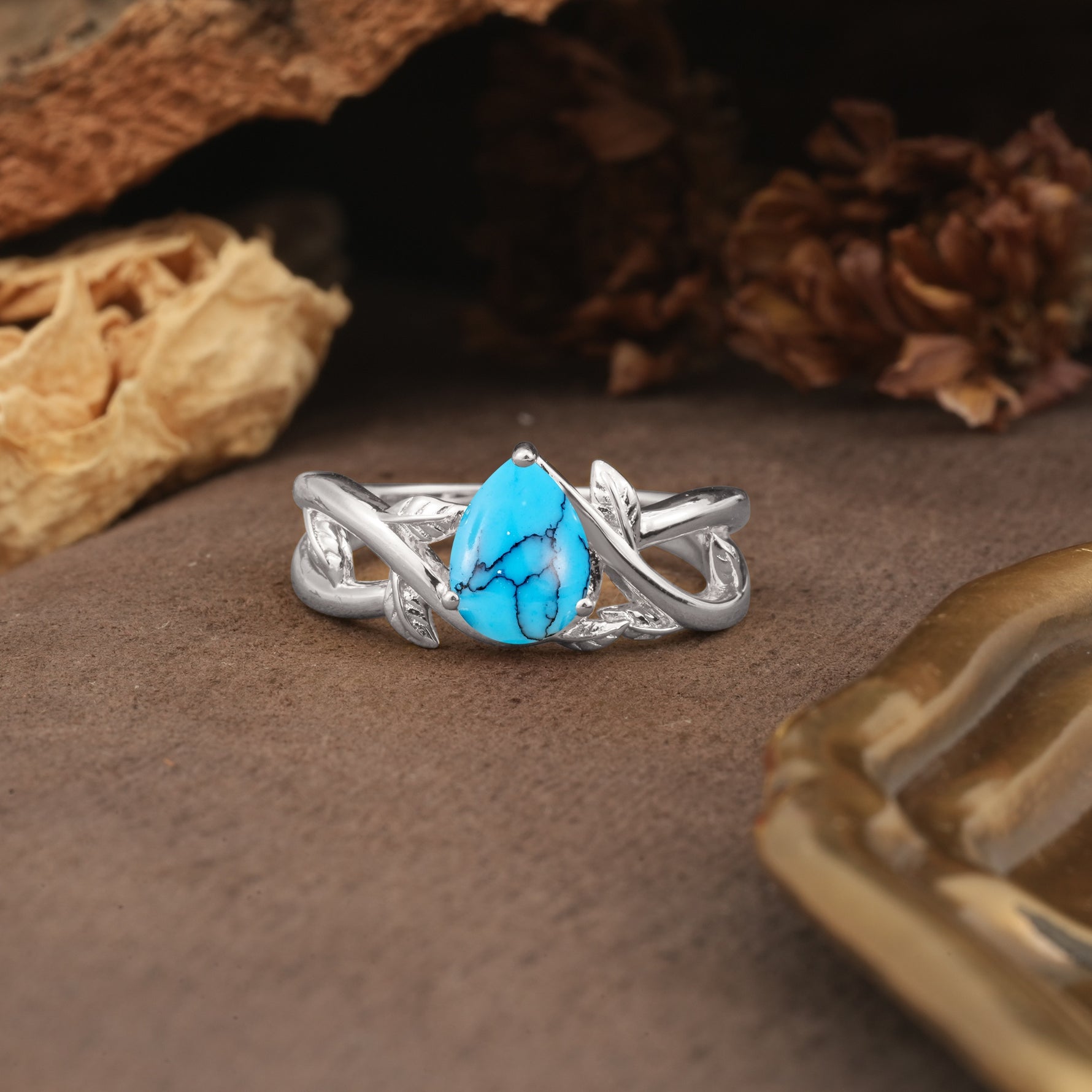 Nature-Inspired Classic Luxury: Entwined 3-Prong Pear Cut Turquoise Engagement Ring - Additional view