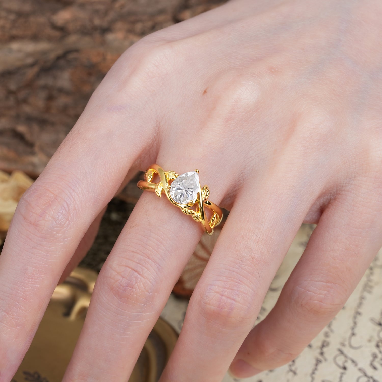 Nature-Inspired Classic Luxury: Entwined 3-Prong Pear Cut Moissanite Engagement Ring
