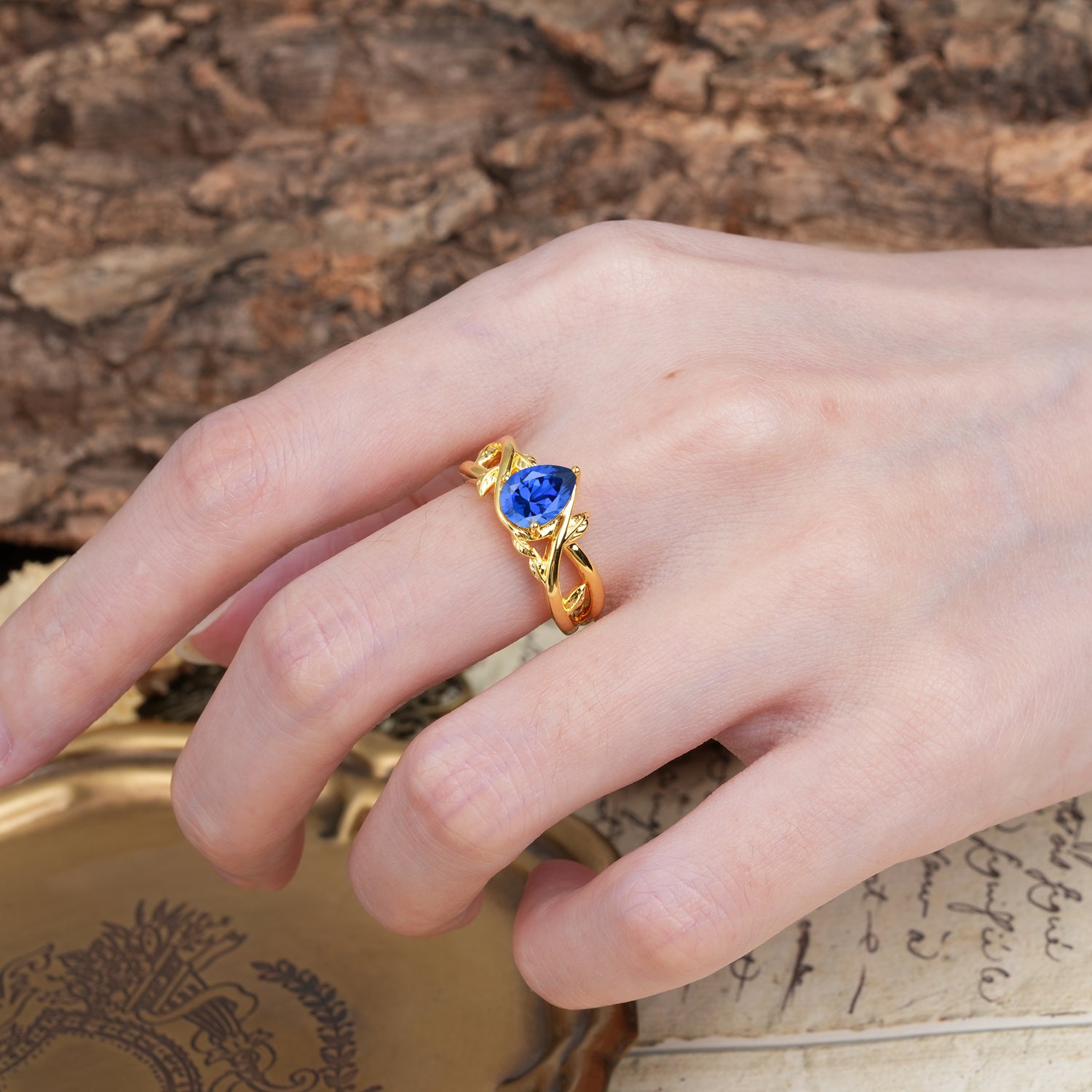 Nature-Inspired Classic Luxury: Entwined 3-Prong Pear Cut Sapphire Engagement Ring