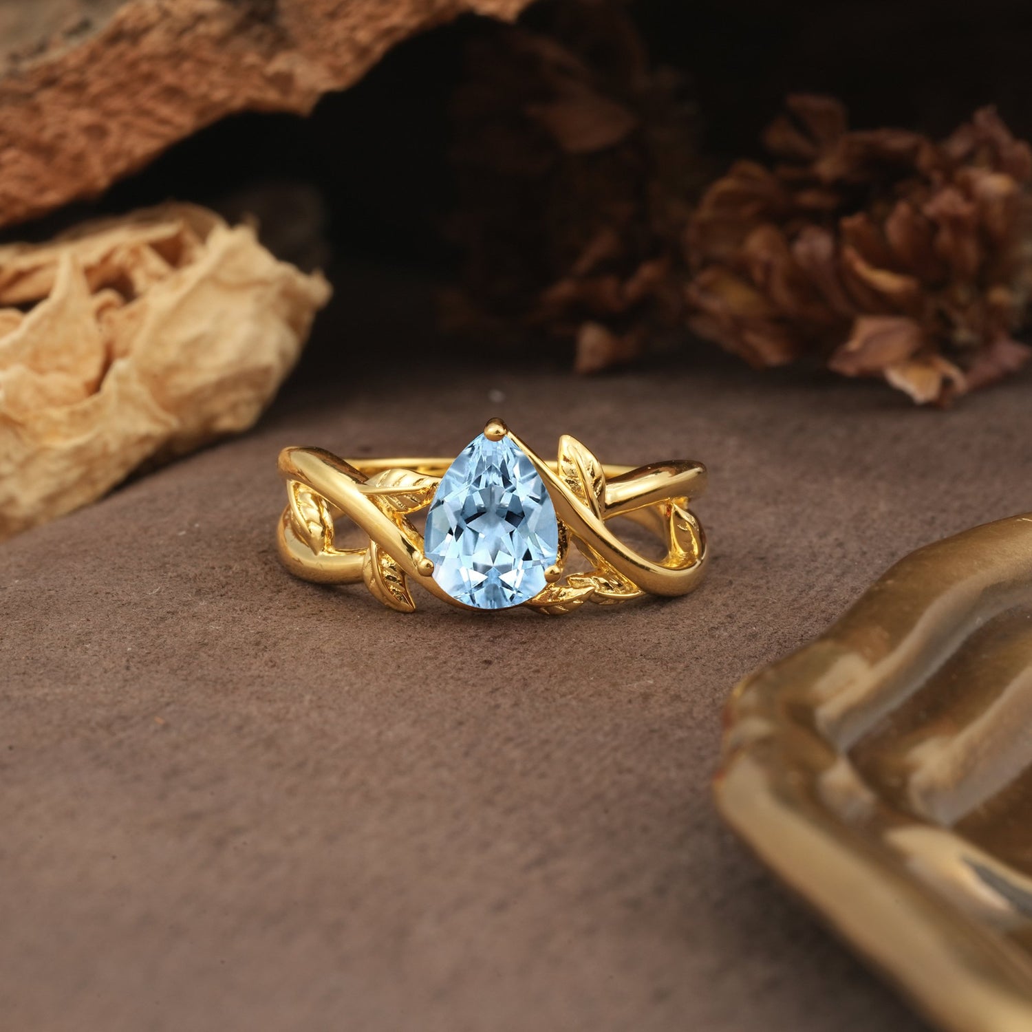 Nature-Inspired Classic Luxury: Entwined 3-Prong Pear Cut Aquamarine Engagement Ring