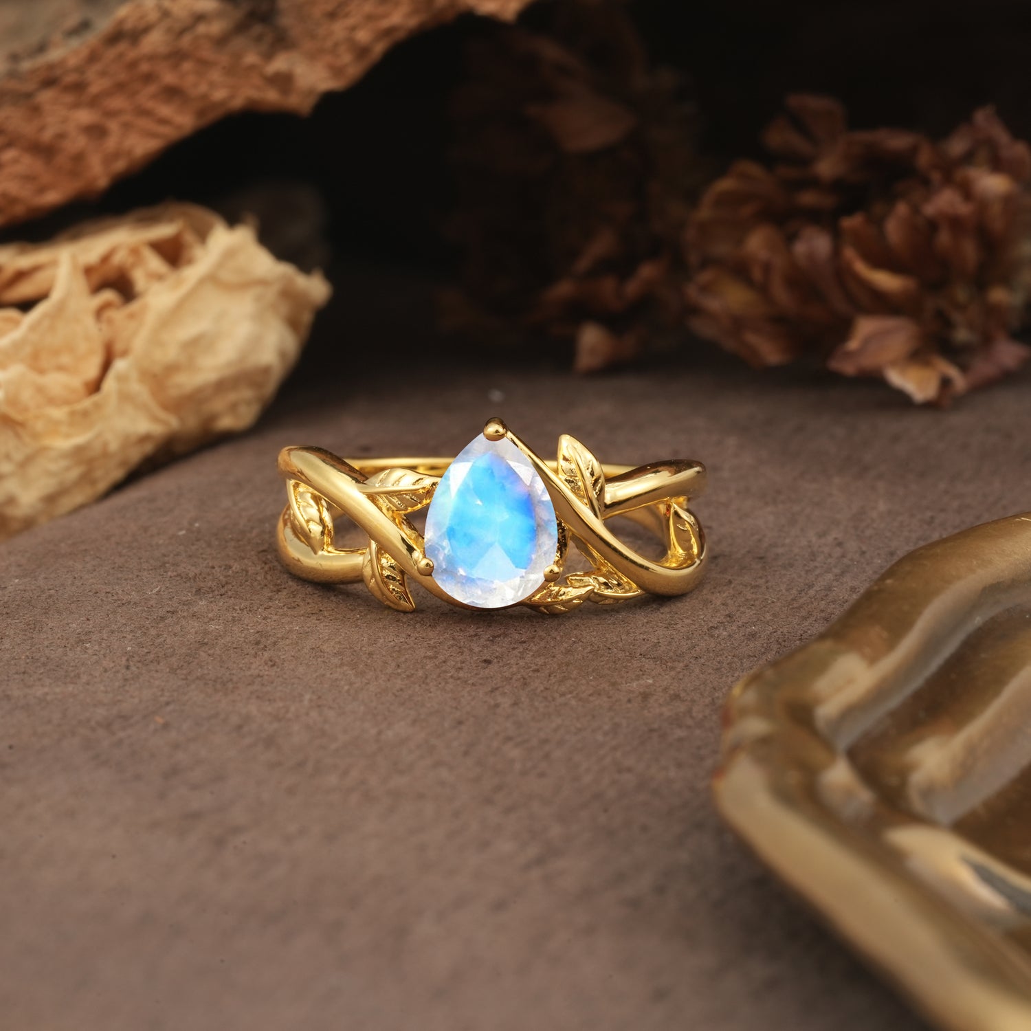 Nature-Inspired Classic Luxury: Entwined 3-Prong Pear Cut Moonstone Engagement Ring